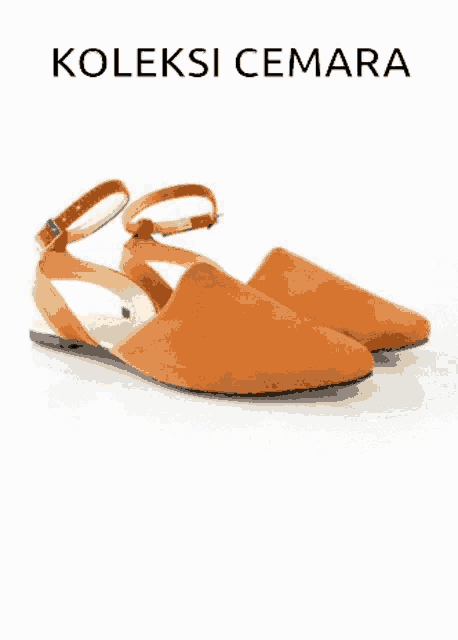 a pair of brown shoes with the words koleksi cemara on the bottom
