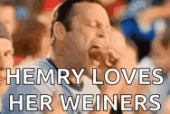 a man screaming in a crowd with the words hemry loves her weiners