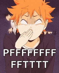 a boy with orange hair is covering his nose with his hand and making a funny face .