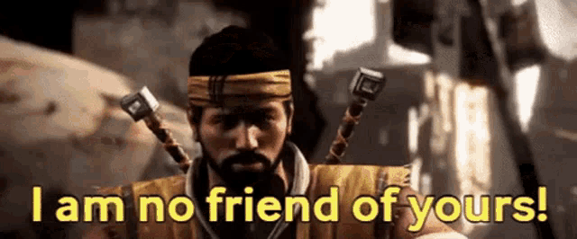 a man with a beard is holding two swords in his hands and says `` i am no friend of yours '' .