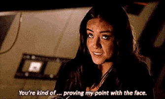 a woman is talking to another woman and saying `` you 're kind of proving my point with the face '' .