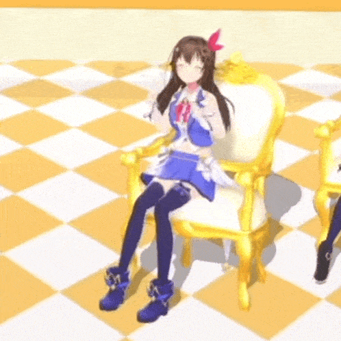 a girl in a blue dress is sitting in a chair