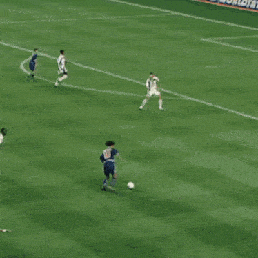 a soccer player wearing a number 10 jersey kicks the ball