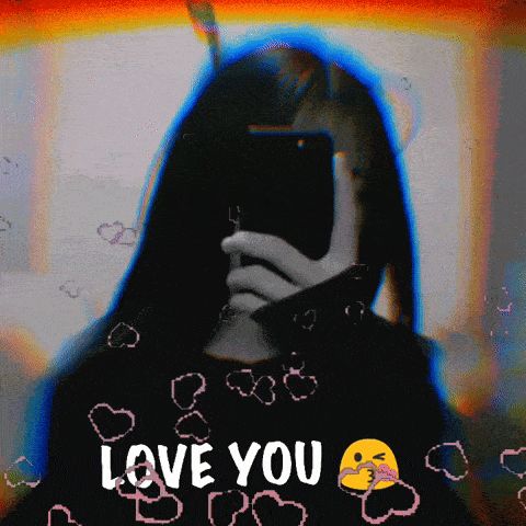 a girl is taking a picture of herself with the words love you behind her