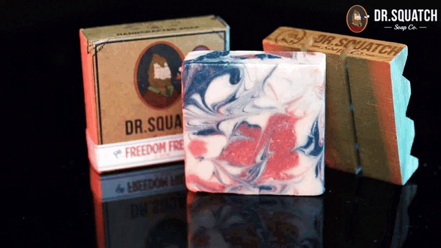 a box of dr. squatch soap sits next to a soap bar