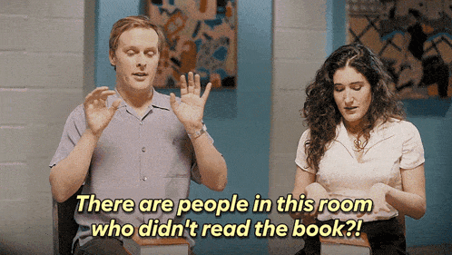 a man and a woman are sitting in a room with the words there are people in this room who didn 't read the book