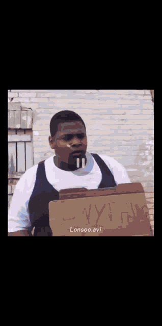 a blurry picture of a man and a woman dancing with lonsoo_avi written in the corner
