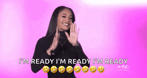 a woman says i 'm ready i 'm ready i 'm ready in a pink background