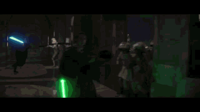 a pixelated image of a person holding a green light saber