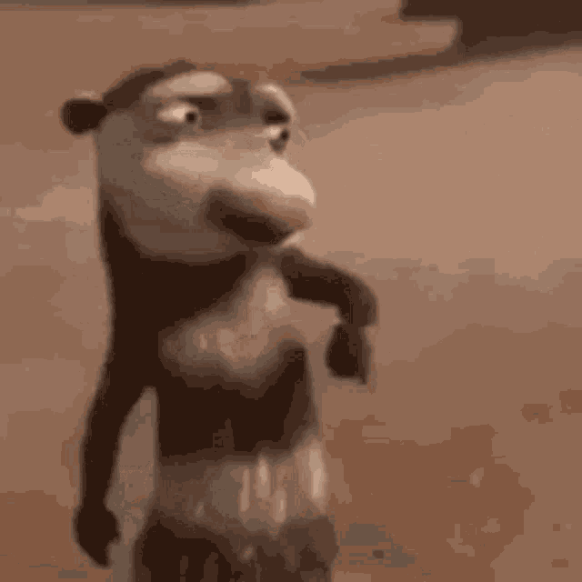 a close up of a cartoon opossum standing on a sandy beach .