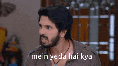 a man with a beard is making a funny face with the words `` mein yeda hai kya '' written next to him .