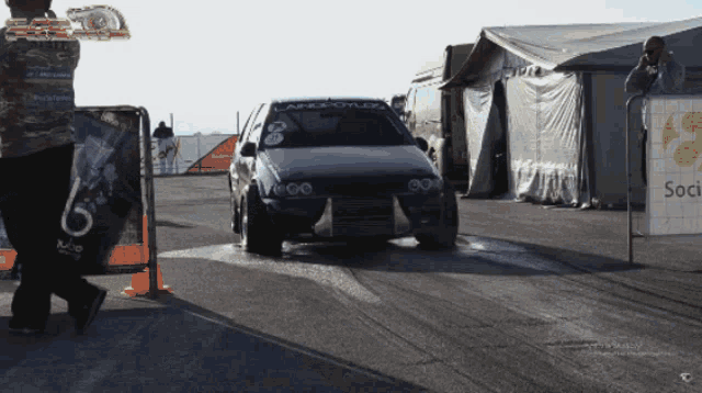 a car that has the number 8 on the side