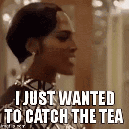 a woman is saying `` i just wanted to catch the tea '' while standing in a room .
