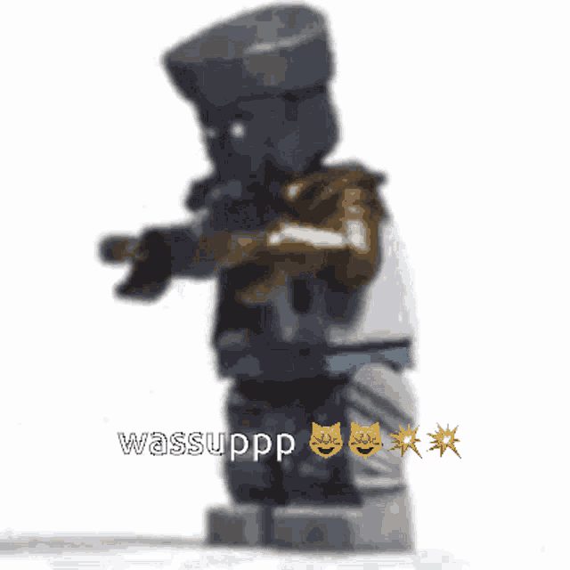 a blurred image of a lego figure with the words wassuppp on it
