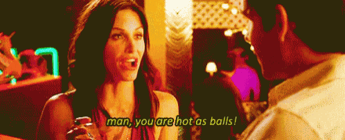 a man and a woman are having a conversation with the woman saying man you are hot as balls
