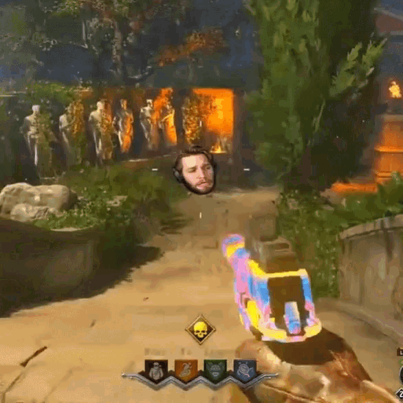 a video game is being played with a man 's head on the screen