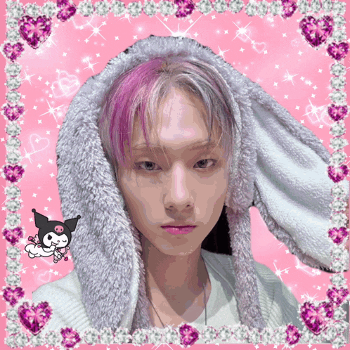 a picture of a boy with bunny ears and a pink background