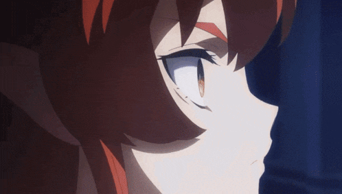a close up of a cartoon character 's face with a surprised look on her face
