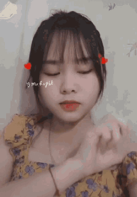 a girl with her eyes closed has the word mr. right on her face
