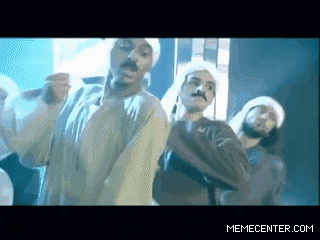 a group of men wearing turbans are dancing in front of a screen that says memecenter.com