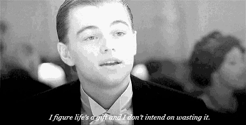 a black and white photo of a man in a tuxedo and tie with a quote from leonardo dicaprio .