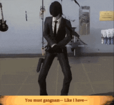 a man in a suit and tie is dancing with a gun in his hand and says you must gangnam like i have