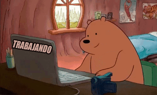 a cartoon bear is sitting at a desk with a laptop that says trabajando
