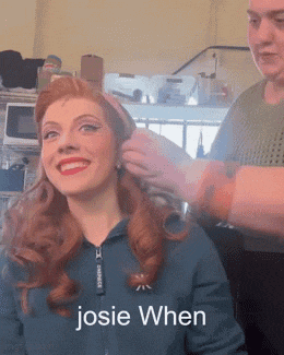 a woman with red hair is getting her hair done by a man with the caption josie when .