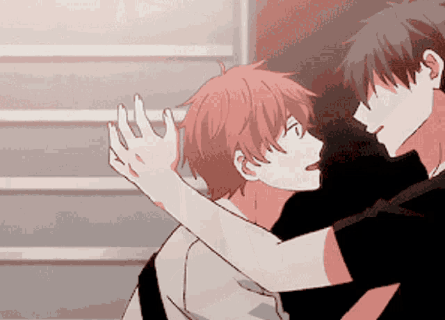 a couple of anime characters hugging each other with one holding the other 's head