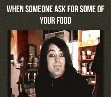 a man with long black hair is looking at the camera with the caption when someone ask for some of your food