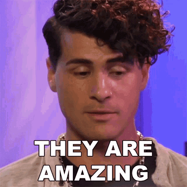 a man with curly hair has the words they are amazing written on his face