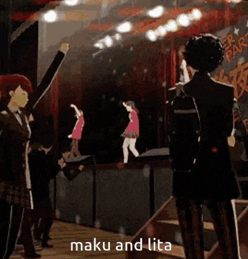 a group of people are dancing on a stage in a video game and a man is standing in front of them .