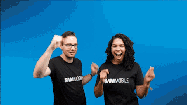 a man and a woman wearing sammobile shirts are dancing