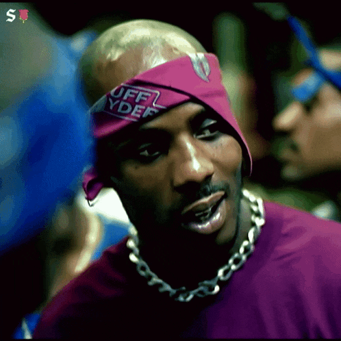 a man wearing a bandana that says uff ydee