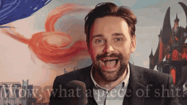 a man with his mouth open and the words wow what a piece of shit