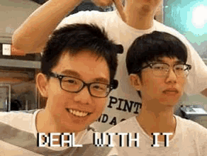 a group of young men are posing for a picture and one has a shirt that says pint on it