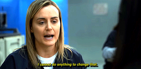 a woman in a prison uniform says i cannot do anything to change that