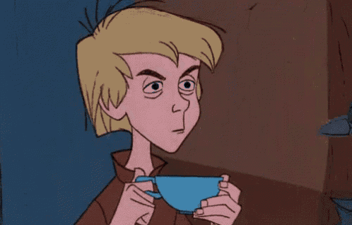 a cartoon character is holding a cup of coffee and making a funny face .