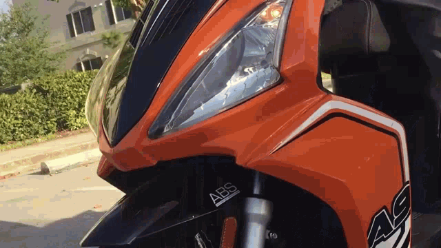 a close up of a motorcycle with abs written on it