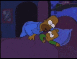 homer simpson and bart simpson are laying in bed