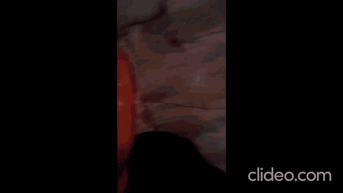 a man with red paint on his face making a funny face