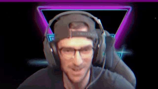 a man wearing headphones and a hat that says ' earforce ' on it