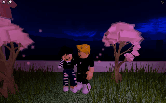 a boy and a girl are standing next to each other in a field with trees in the background