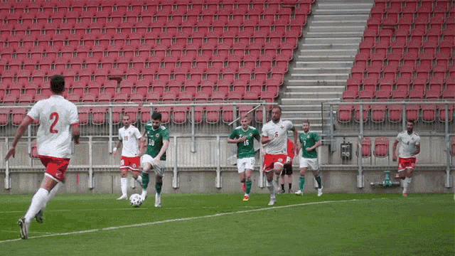 a soccer player with the number 2 on the back of his jersey