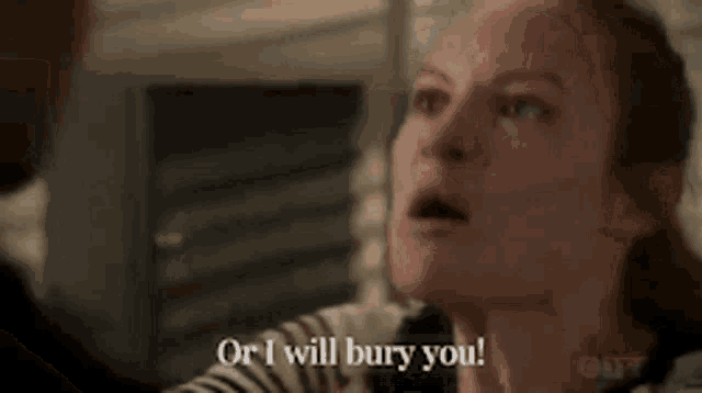 a woman says or i will bury you in a close up