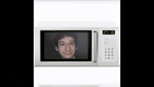 a microwave oven with a picture of a man on the screen