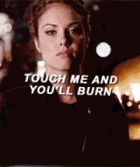 a close up of a woman 's face with a quote that says `` touch me and you 'll burn '' .