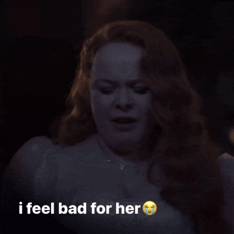 a woman in a white dress is crying with the words i feel bad for her above her