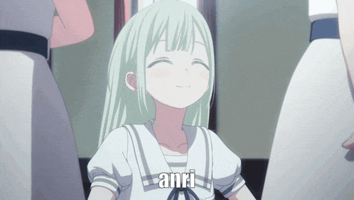 a girl with green hair is smiling and the word anri is on her shirt