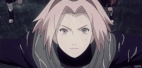 a close up of a cartoon character with pink hair .